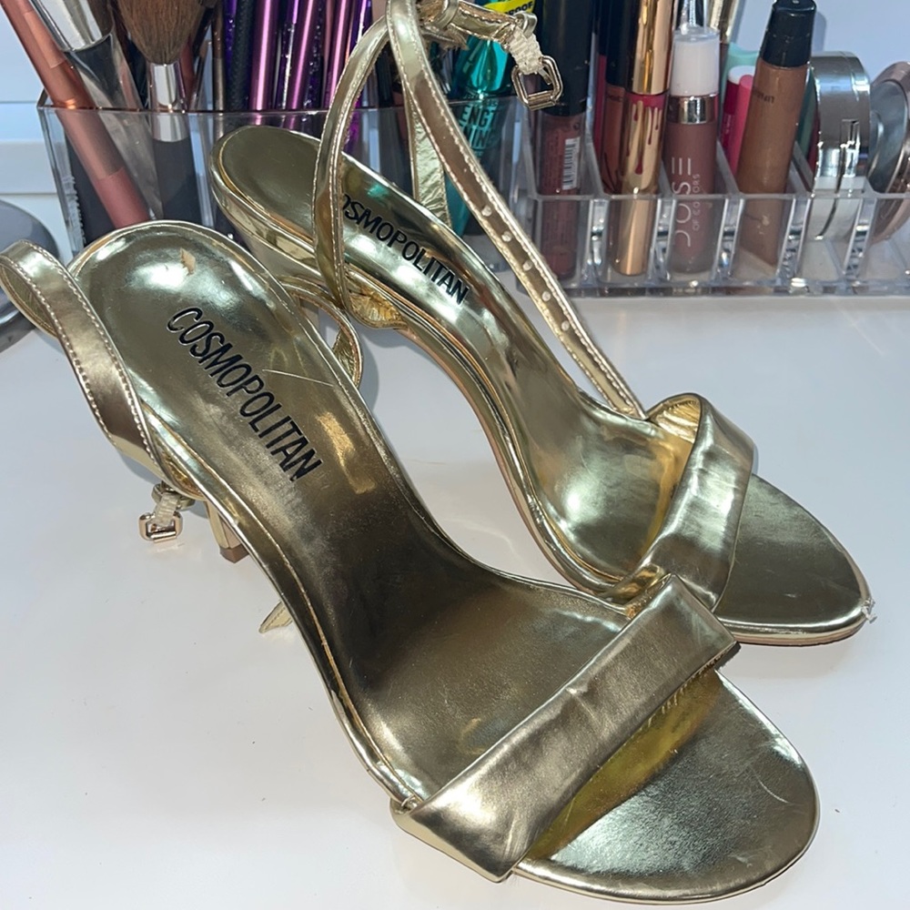 Cosmopolitan gold heels